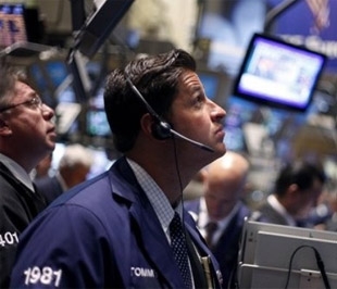 Chứng khoán Mỹ đã phục hồi trở lại sau phiên giảm điểm mạnh trước đó - Ảnh: AP.