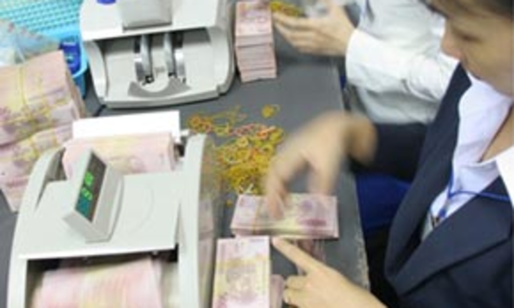 Kinh doanh ngân hàng thuộc lĩnh vực kinh doanh có điều kiện và Ngân hàng Nhà nước không thể dễ dãi - Ảnh: Việt Tuấn.
