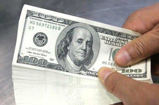 Theo niêm yết của các ngân hàng thương mại, tỷ giá USD/VND đứng yên trong tháng 1 vừa qua - Ảnh: Reuters.