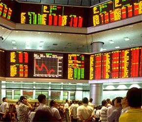 Một phiên giao dịch tại thị trường chứng khoán Malaysia - Ảnh: Kenneth Rice.