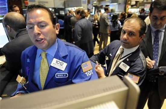 Sau phiên tăng điểm này, cả ba chỉ số chứng khoán Mỹ đã thiết lập mức đỉnh mới trong hơn 18 tháng qua - Ảnh: AP.