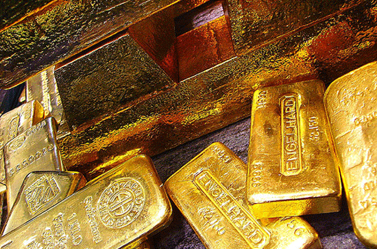 Nhu cầu đầu tư vào vàng và nhu cầu vàng vật chất trên thế giới đang ở thời điểm mạnh, đẩy giá vàng tăng cao. Tuần trước, giá vàng đã có 3 ngày lập kỷ lục - Ảnh: Reuters.