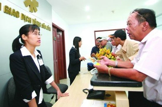 Một nhà đầu tư ở sàn giao dịch vàng Sài Gòn - Ảnh: Lê Toàn.