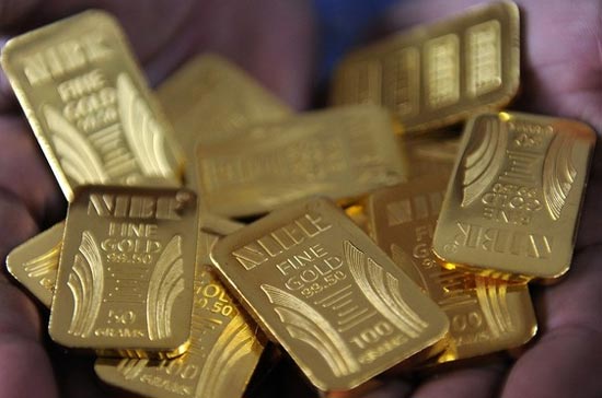 Trên thị trường thế giới, giá vàng khởi động năm 2010 với mức tăng yếu ớt do tạm thời chưa có nhiều thông tin tác động - Ảnh: Getty Images.