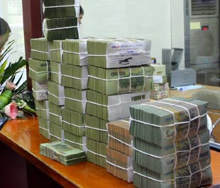 Tỷ trọng vốn của khối doanh nghiệp Nhà nước trong tổng vốn của nền kinh tế hàng năm luôn cao nhất - Ảnh : Việt Tuấn.