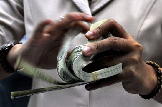 Chỉ trong những ngày đầu tháng 10, tỷ giá USD/VND theo công bố của nhà điều hành cũng như trên biểu niêm yết của các ngân hàng thương mại đều đã tăng mạnh - Ảnh: Getty.