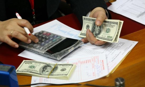 Đi tìm nguyên nhân thực của căng thẳng tỷ giá