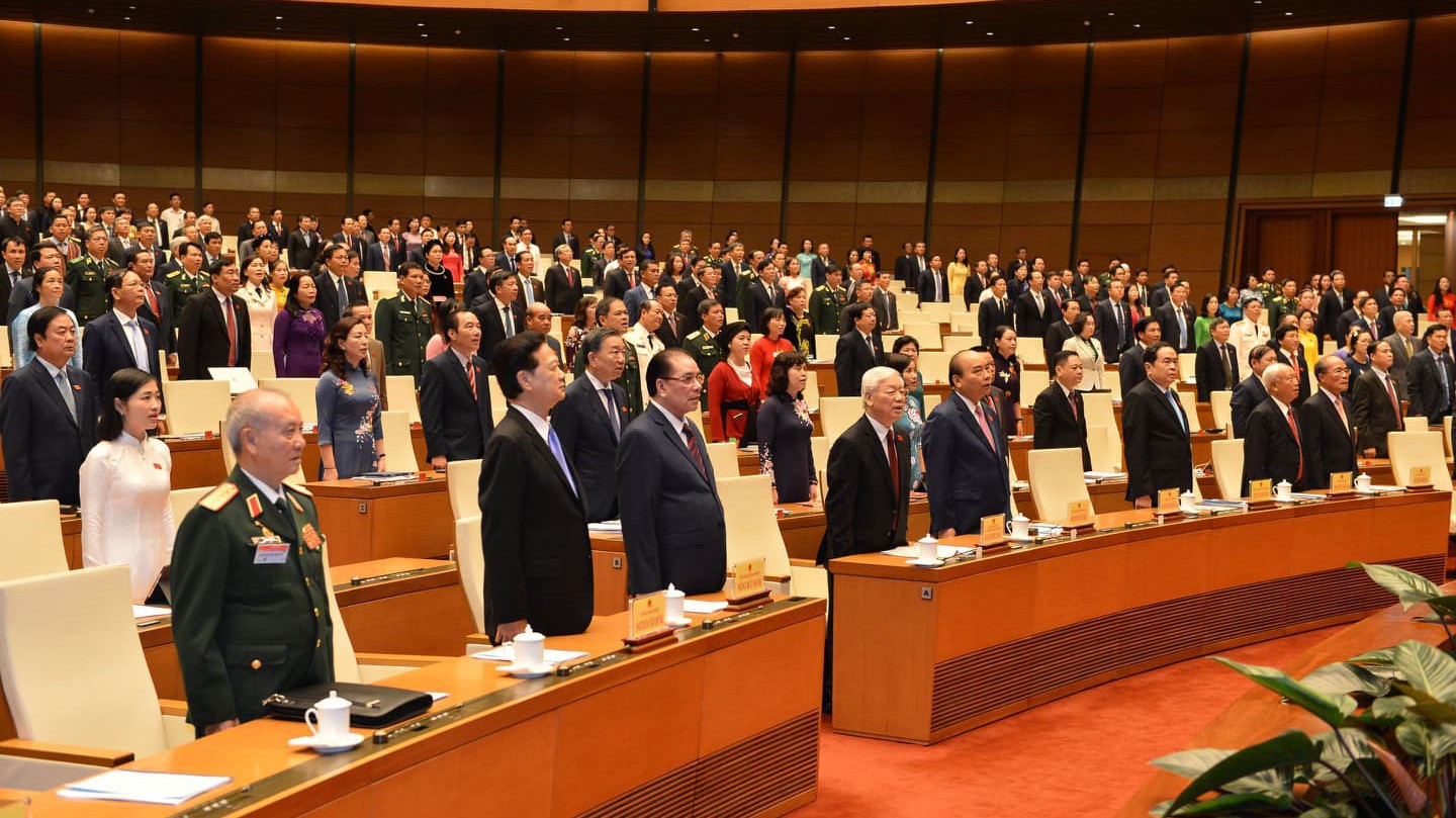 Tống bí thư, Chủ tịch nước Nguyễn Phú Trọng và các vị đại biểu trong lế chào cờ - Ảnh: Quang Phúc 
