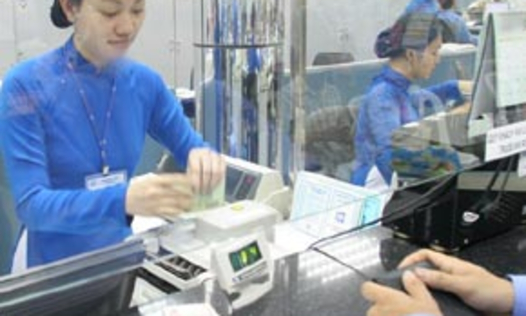 Cục diện của lĩnh vực ngân hàng đang thay đổi nhanh từ thời điểm 1/4/2007, cột mốc Việt Nam cam kết cho thành lập chi nhánh ngân hàng 100% vốn nước ngoài - Ảnh: Việt Tuấn.