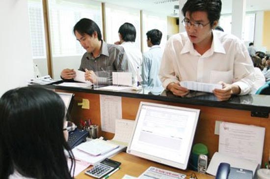 Tài chính là một trong những lĩnh vực đòi hỏi độ bảo mật dữ liệu cao. Ảnh chụp tại một công ty chứng khoán ở Tp.HCM - Ảnh: Lê Toàn.