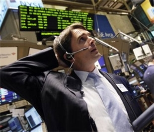 Chứng khoán Mỹ đã tăng điểm nhờ lợi nhuận của Wal-Mart vượt dự báo - Ảnh: AP.