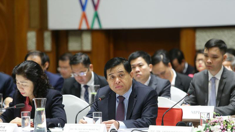 Bộ trưởng Bộ Kế hoạch và đầu tư Nguyễn Chí Dũng phát biểu tại diễn đàn. 