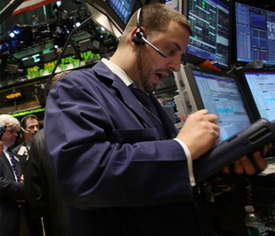 Chứng khoán Mỹ đã tăng điểm trở lại sau một giờ lên điểm mạnh vào cuối ngày giao dịch - Ảnh: Getty Images.