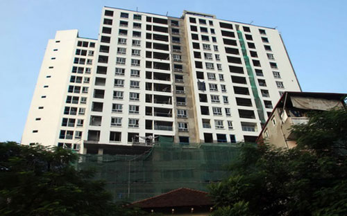 Thanh tra thành phố Hà Nội đánh giá công tác khắc phục sai phạm tại dự án 8B Lê Trực là quá chậm.<br>