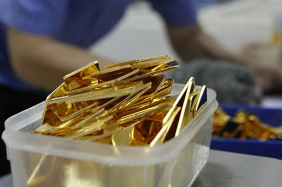 Để kích thích giao dịch, các doanh nghiệp kim hoàn đang áp dụng mức chênh lệch giá mua/bán vàng ở mức khá thấp - Ảnh: Reuters.