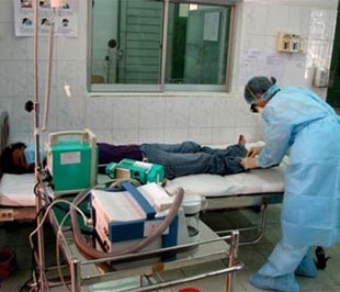 Tập huấn tình huống có người nhiễm H1N1 tại quận 8, Tp.HCM - Ảnh: DT.