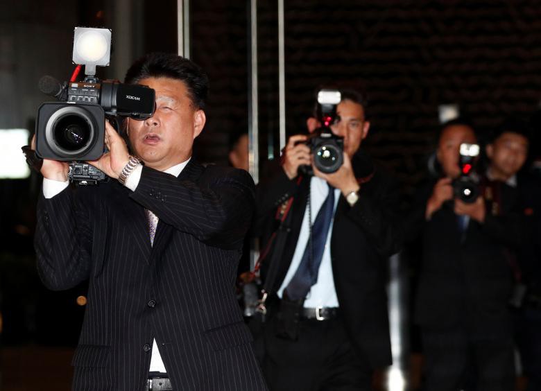 Chùm ảnh ông Kim Jong Un đi dạo đêm ở Singapore - Ảnh 9.