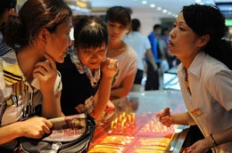 Vàng tăng trở lại do lực cầu thế giới cao hơn - Ảnh: Getty.