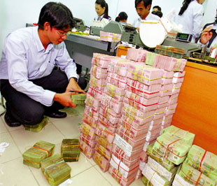 Nền kinh tế chưa thoát khỏi suy giảm nhưng các ngân hàng không những trụ vững mà còn lãi!