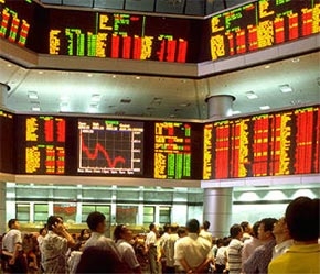 Giao dịch tại thị trường chứng khoán Malaysia - Ảnh: Kenneth Rice.