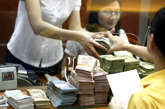 Bối cảnh đã thay đổi kể từ năm 2007, khi hệ thống ngân hàng Việt Nam đã gặp phải hai vấn đề lớn gồm: (1) rủi ro về mặt thanh khoản và (2) rủi ro từ các hoạt động liên quan đến chứng khoán và bất động sản - Ảnh: Reuters.