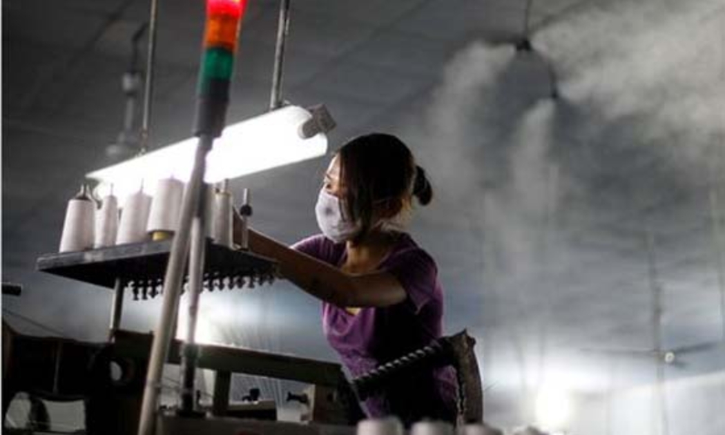 Lương công nhân tại Trung Quốc đang được nâng lên - Ảnh: Reuters/NYTimes.