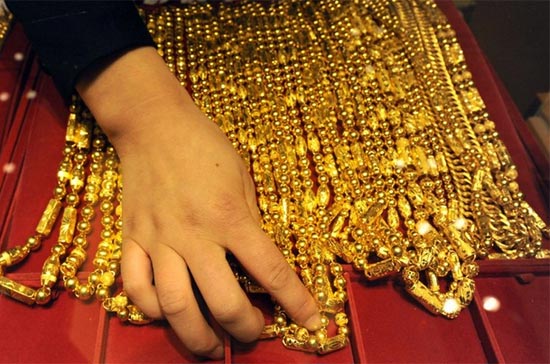 Sau khi phá vỡ ngưỡng kháng cự quan trọng 1.140 USD/oz, giá vàng thế giới đã leo thẳng lên mức 1.154 USD/oz, cao nhất trong vòng 12 tuần qua - Ảnh: Getty Images.