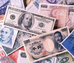 Thiếu hụt ngoại tệ và rủi ro tỷ giá là một trong bảy nguy cơ tiềm ẩn trong nhiều dự án FDI đầu tư mới vào Việt Nam - Ảnh: Việt Tuấn.