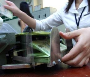 Nợ xấu luôn là con số bí ẩn tại các ngân hàng thương mại nhà nước - Ảnh: Việt Tuấn.