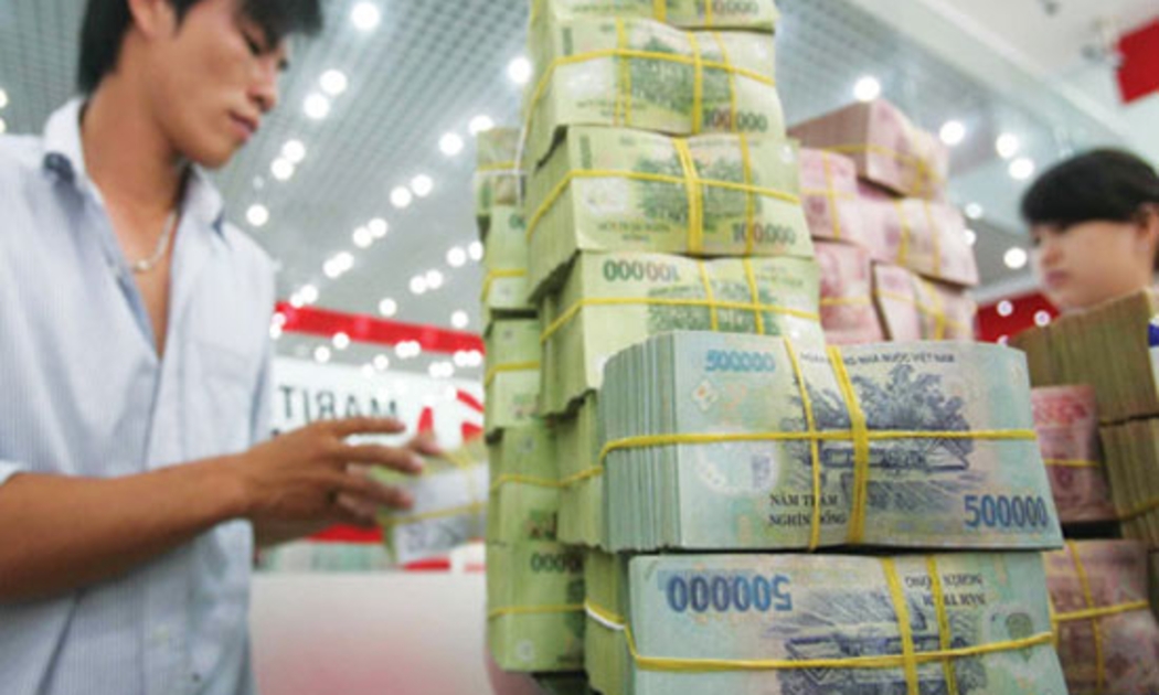 Đầu tuần này, một số báo dẫn nguồn báo cáo của Ủy ban Giám sát Tài chính Quốc gia, nêu: tính đến cuối năm 2011, .tổng dư nợ cho vay bất động sản là 348.000 tỷ đồng - Ảnh: TN