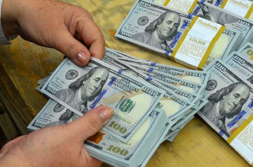 Việc FED tăng lãi suất USD được dự báo ít tác động đến tỷ giá USD/VND.<br>