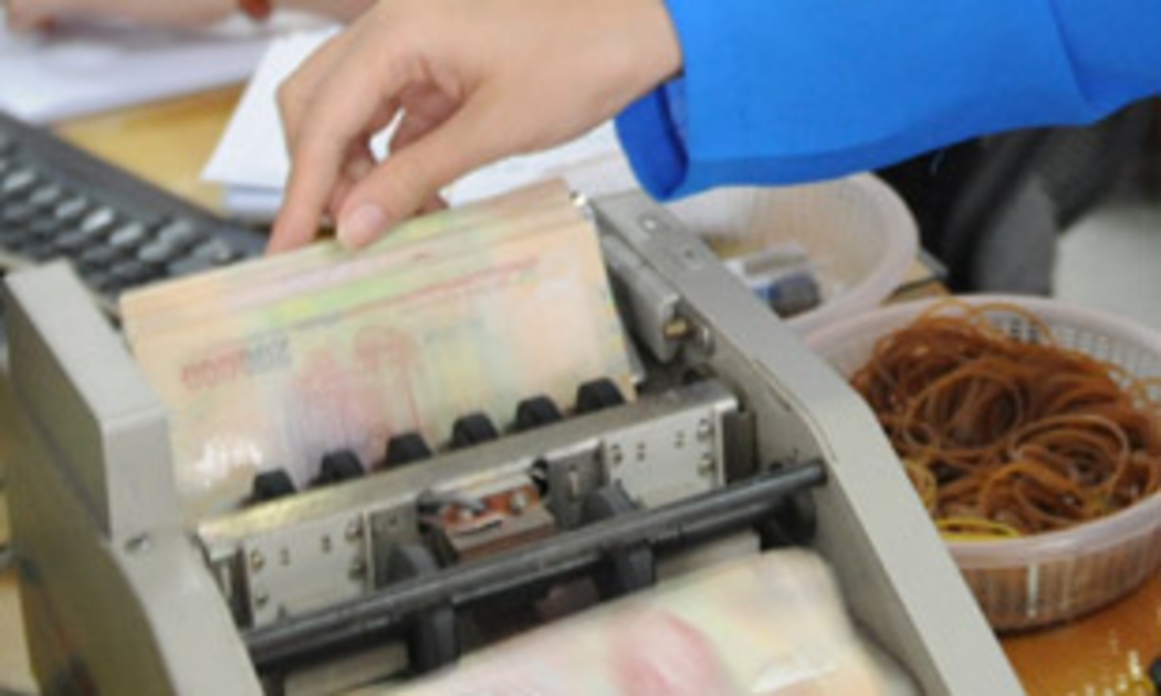 WB khuyến nghị Chính phủ nên tăng cường chất lượng của công tác giám sát ngân hàng, quản lý và theo dõi các luồng chu chuyển vốn quốc tế,... - Ảnh: Quang Liên.
