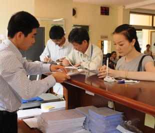 Tính đến ngày 21/5/2009, dư nợ của nhóm ngân hàng thương mại nhà nước và quỹ tín dụng nhân dân Trung ương đạt 230.597,24 tỷ đồng - Ảnh: Quang Liên.