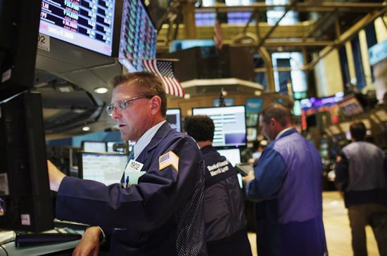 Chốt phiên giao dịch ngày 18/12, chỉ số công nghiệp Dow Jones tăng mạnh 115,57 điểm, tương ứng 0,87%, lên 13.350,96 điểm - <i>Ảnh: Getty</i>.