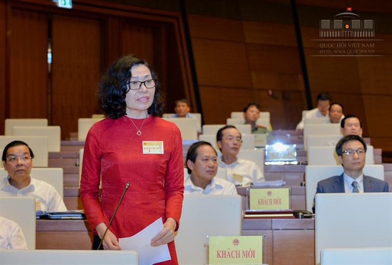 Tổng giám đốc Bảo hiểm Xã hội Việt Nam Nguyễn Thị Minh tham gia giải trình - Ảnh: Quochoi.vn.