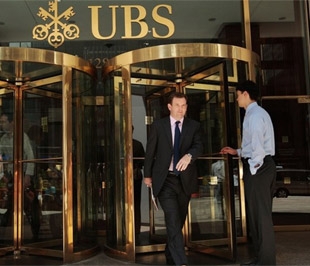 Chỉ vài giờ sau khi thỏa thuận giữa UBS và IRS được đưa ra, Chính phủ Thụy Sỹ cũng tuyên bố sẽ bán lại cổ phần 9% tại UBS - Ảnh: Getty Images.