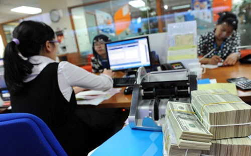 Dù việc mở room cho nhà đầu tư ngoại trong lĩnh vực có thể sẽ đem lại 
nhiều lợi ích cho hệ thống ngân hàng Việt Nam. Tuy nhiên, vấn đề này 
hiện vẫn đang còn là nỗi e ngại của không ít các nhà hoạch định chính 
sách - Ảnh minh họa. 