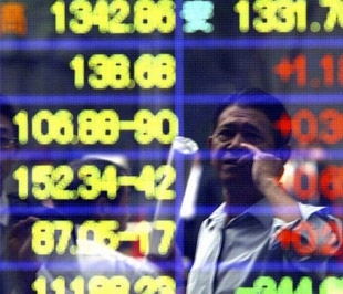 Ảnh hưởng cuộc khủng hoảng tài chính đang lan rộng ra toàn cầu - Ảnh: Reuters.