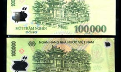 Tiền giả thu giữ qua ngân hàng tiếp tục giảm