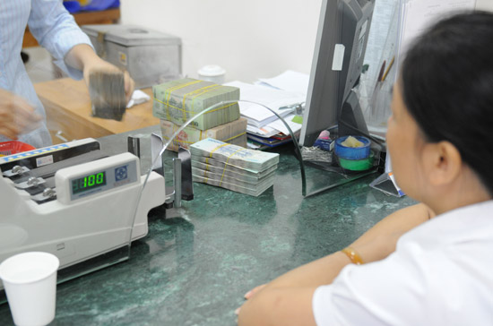 Dường như thành quy luật, nhu cầu vốn những tháng giáp Tết Nguyên đán thường bị đẩy cao hơn so với các thời điểm khác trong năm - Ảnh: Quang Liên.