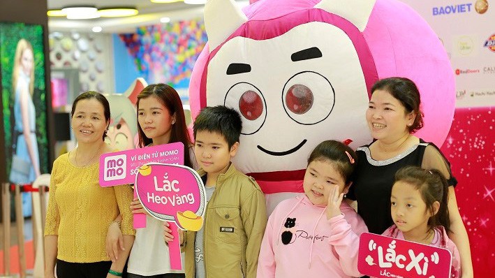 Người tiêu dùng yêu thích Ví MoMo và tính năng Lắc xì – Lắc heo vàng nhận lì xì.