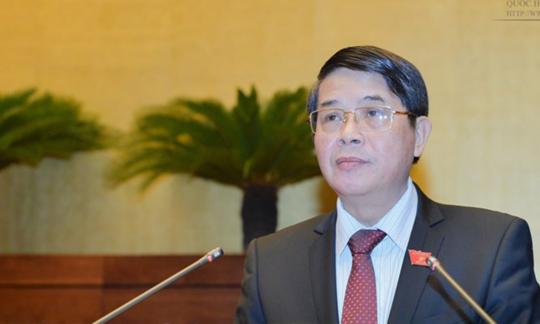 Chủ nhiệm Uỷ ban Tài chính - Ngân sách Nguyễn Đức Hải trình bày báo cáo thẩm tra dự án Luật Quản lý nợ công (sửa đổi).