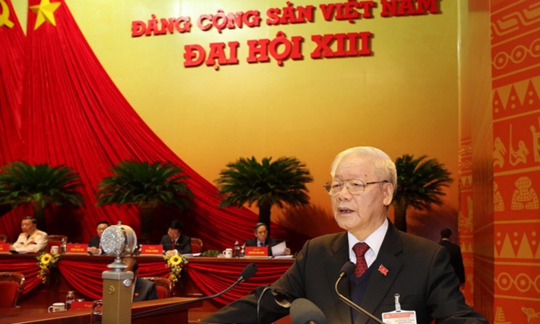 Tổng Bí thư, Chủ tịch nước Nguyễn Phú Trọng trình bày Báo cáo của Ban chấp hành Trung ương khóa XII về các văn kiện trình Đại hội XIII.