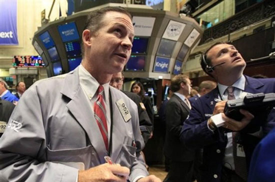 Khoảng 56% cổ phiếu ở sàn New York tăng điểm, trong khi có 53% cổ phiếu ở sàn Nasdaq giảm điểm - Ảnh: AP.