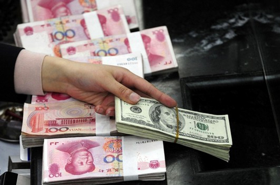 Mặc dù không đưa ra thời gian biểu cho việc duy trì tỷ giá hối đoái hiện nay, nhưng Trung Quốc khẳng định việc đánh giá lại đồng NDT chỉ có thể được thực hiện sau 2 hoặc 3 năm nữa - Ảnh: Reuters.