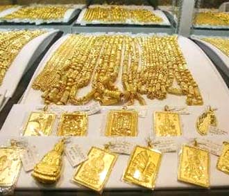 Giá vàng đang tăng tốc trở lại - Ảnh: Reuters.