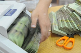 Lãi suất VND và USD trên thị trường liên ngân hàng tuần qua cùng tăng ở nhiều kỳ hạn, đặc biệt là mức tăng khá mạnh của lãi suất USD - Ảnh: Quang Liên.