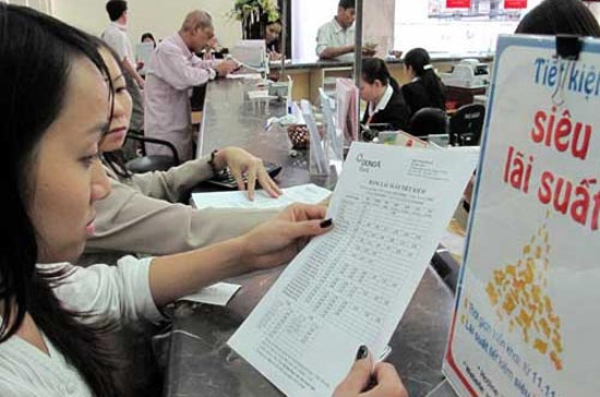 Thông tin giữ nguyên lãi suất cơ bản đã chấm dứt mọi sự đồn đoán về khả năng tăng lãi suất cơ bản - Ảnh: Thanh Đạm.