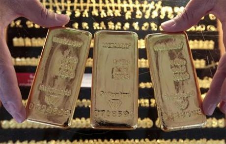 Nguyên nhân chính khiến giá vàng thế giới giảm mạnh đêm qua là việc Ngân hàng Trung ương Trung Quốc (PBoC) bất ngờ nâng lãi suất cơ bản đồng Nhân dân tệ - Ảnh: Reuters.