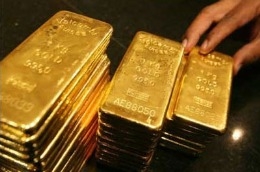 Sự quay đầu đi xuống của giá vàng trong phiên sáng nay tại châu Á có thể là một bằng chứng về sự chốt lời của một số quỹ đầu tư - Ảnh: Reuters.